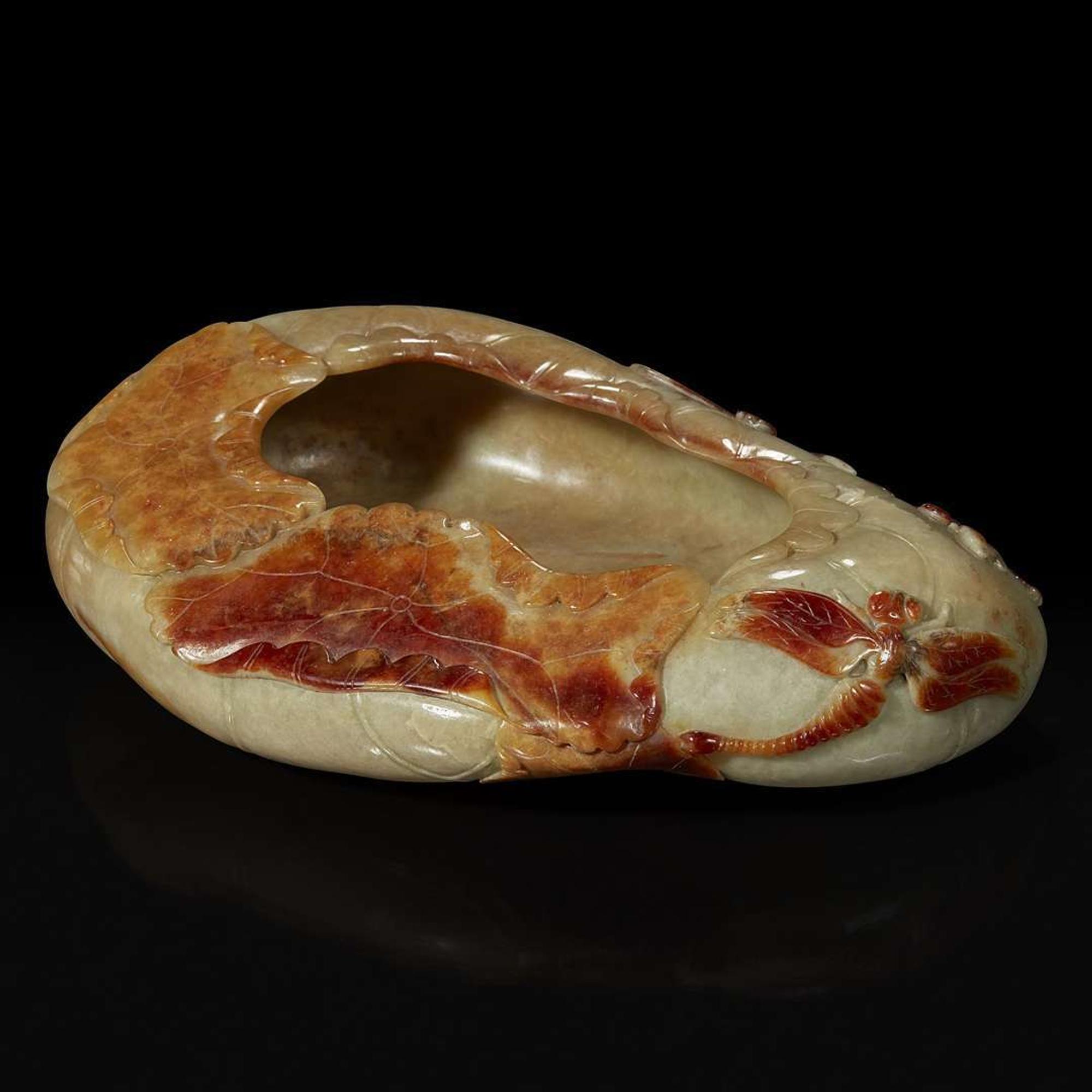 A Chinese carved russet and beige jade "Lotus Leaf" brush washer 赤褐色沁灰玉莲叶水洗