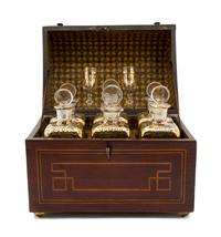 A Dutch Mahogany Inlaid Decanter Set, Height of case 9 1/4 x width 11 3/4 x depth 7 1/2 inches.