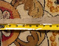 A Continental Needlepoint Carpet