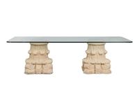 A Glass-Top Dining Table with Dual Composition Pedestal Base
