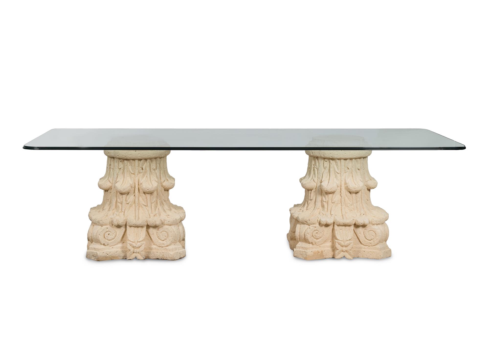 A Glass-Top Dining Table with Dual Composition Pedestal Base