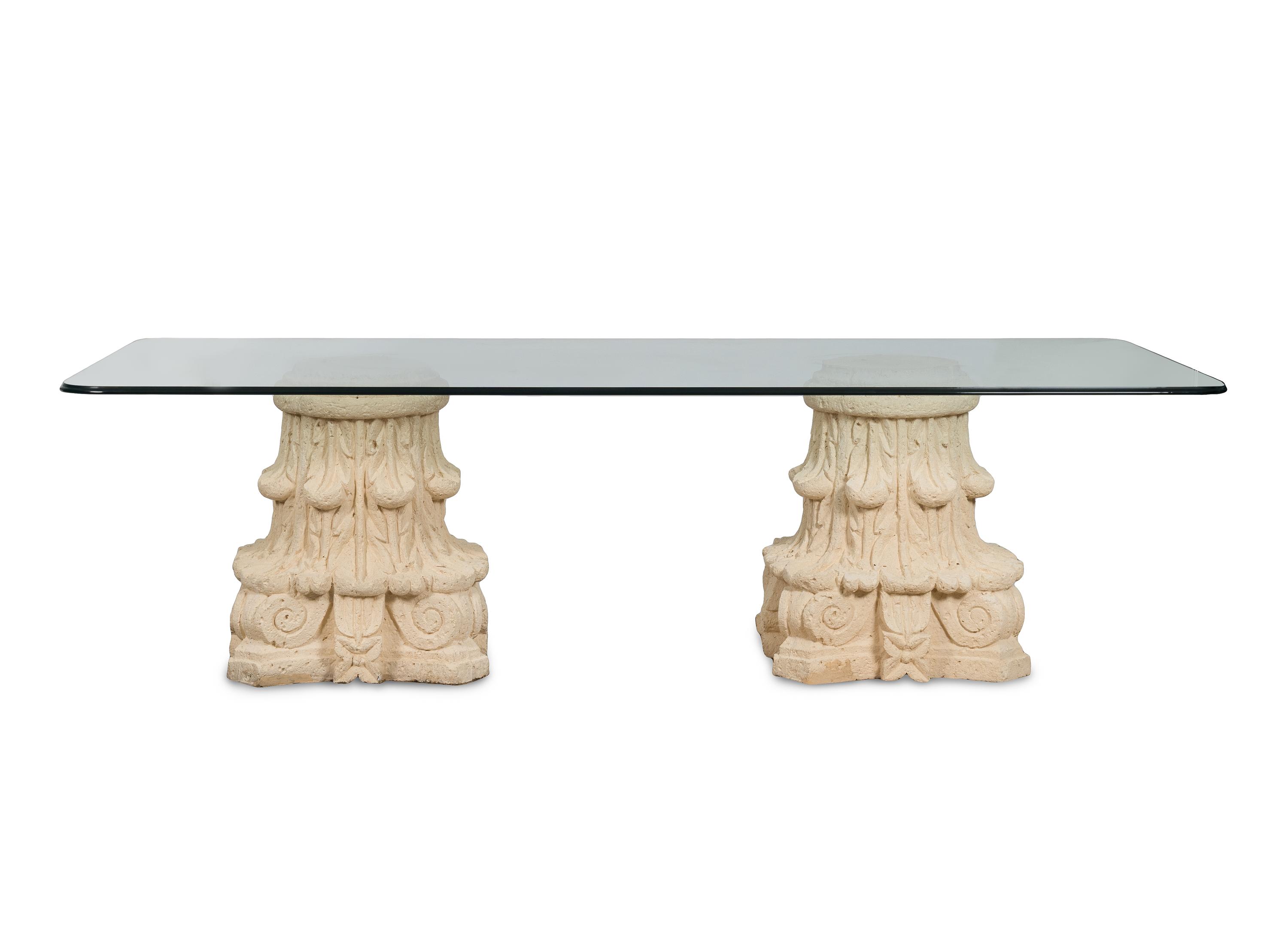 A Glass-Top Dining Table with Dual Composition Pedestal Base