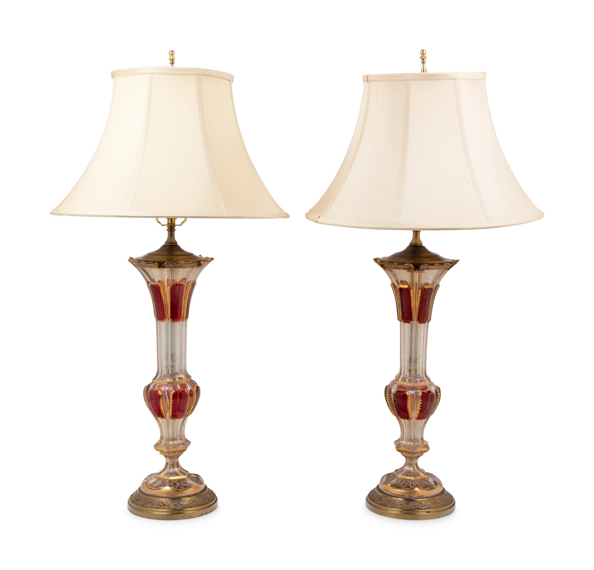 A Pair of Bohemian Cranberry and Clear Glass Vases Mounted as Lamps