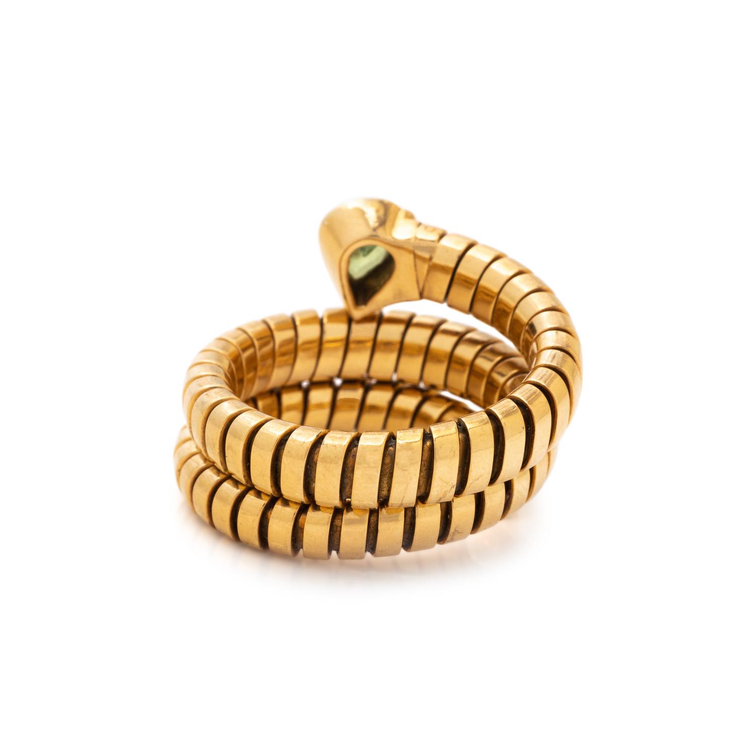 BVLGARI, YELLOW GOLD AND PERIDOT 'SERPENTI' RING