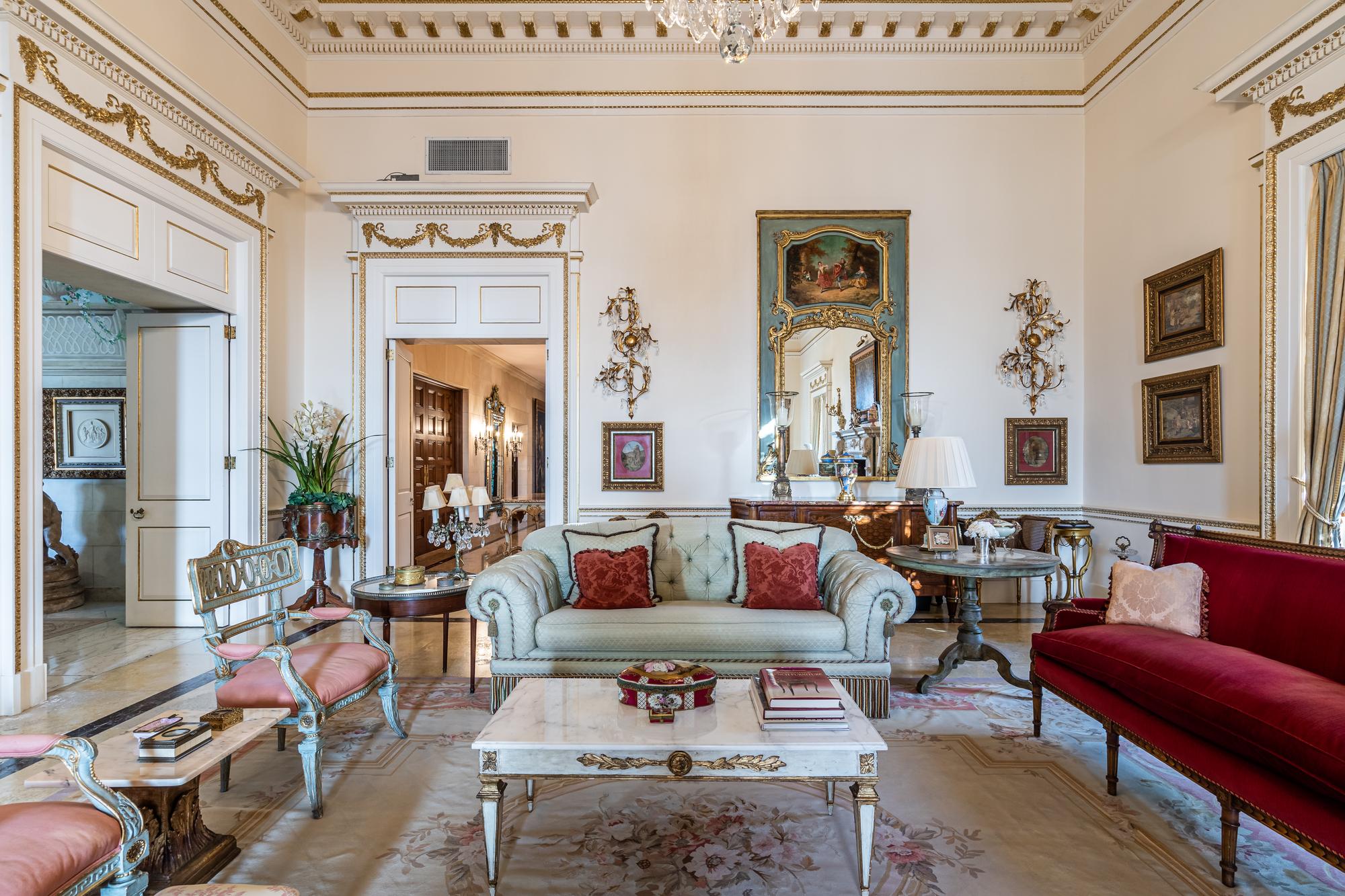 A Louis XVI Style Parcel Gilt Walnut Sofa