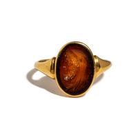 A Roman Carnelian Ring Stone with a Portrait Head of the God Cronus — Set in a gold ring