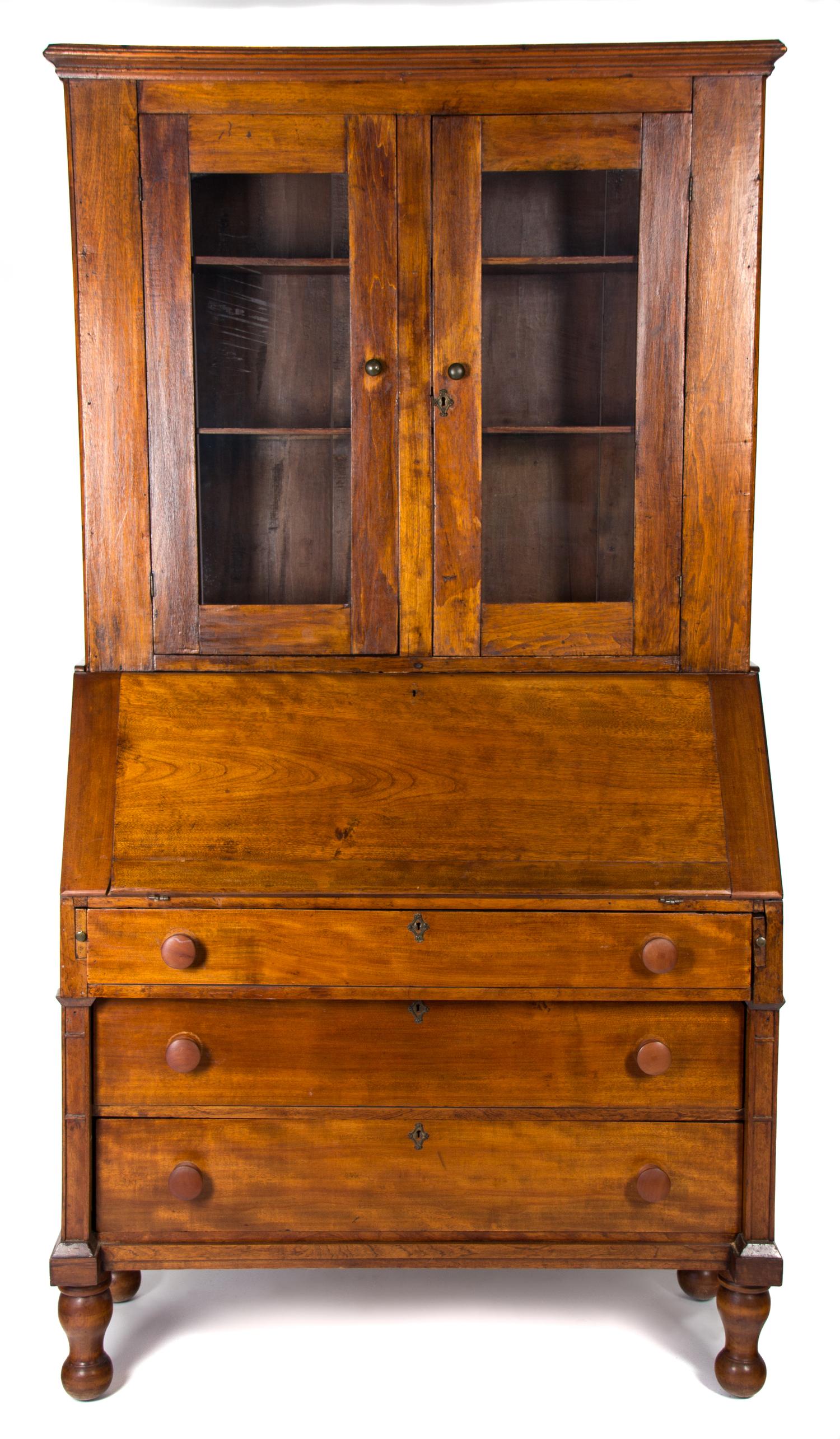 An American Country Style Pine Secretary Bookcase Height 79 x width 42 x depth 19 1/2 inches. — 19TH CENTURY
