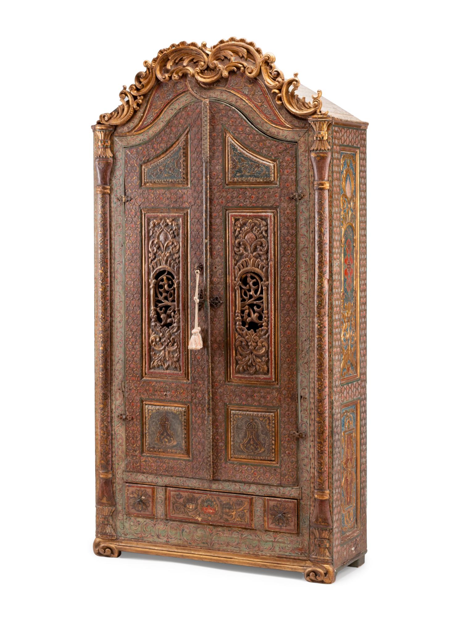 A Continental Painted and Parcel Gilt Cabinet