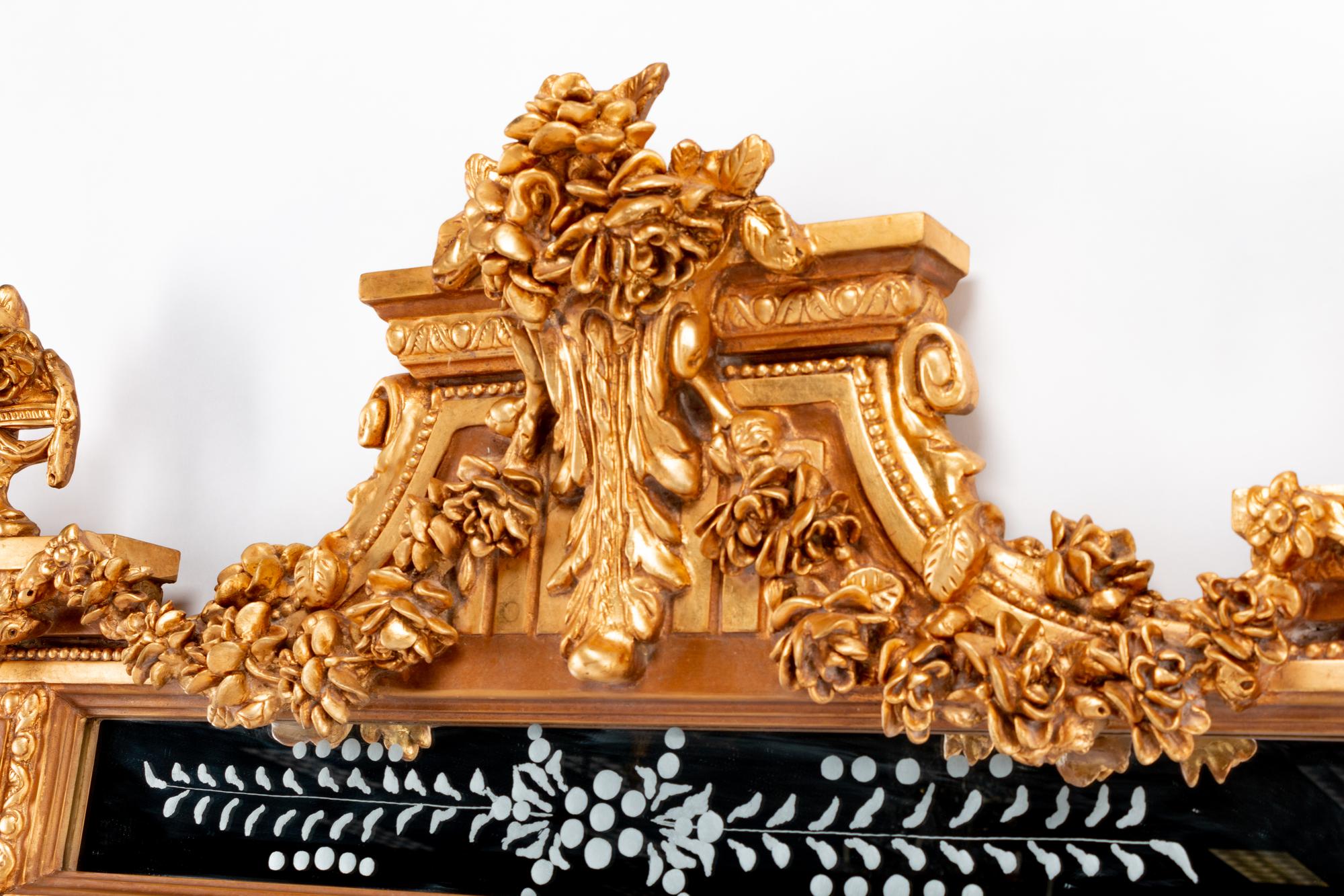 A Pair of Louis XVI Style Gilded Mirrors