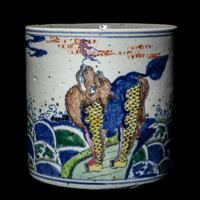 A Chinese Wucai and Underglaze Blue 'Qilin' Porcelain Brushpot, Bitong