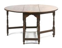 A William and Mary Style Oak Gate-Leg Table, Height 27 3/8 x width 36 1/4 x depth 16 inches.