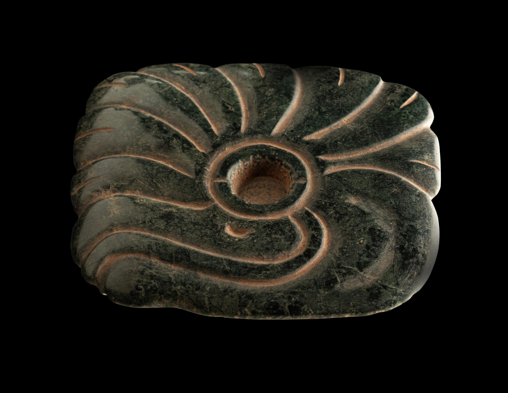 A Pair of Maya Jade Earspools in the Form of a Quetzal Bird