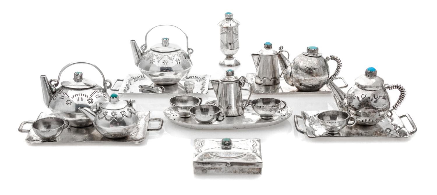 A Collection of Native American Silver Table Articles, Various Makers, comprising five trays, five cups, two pairs of teapots, a pair o