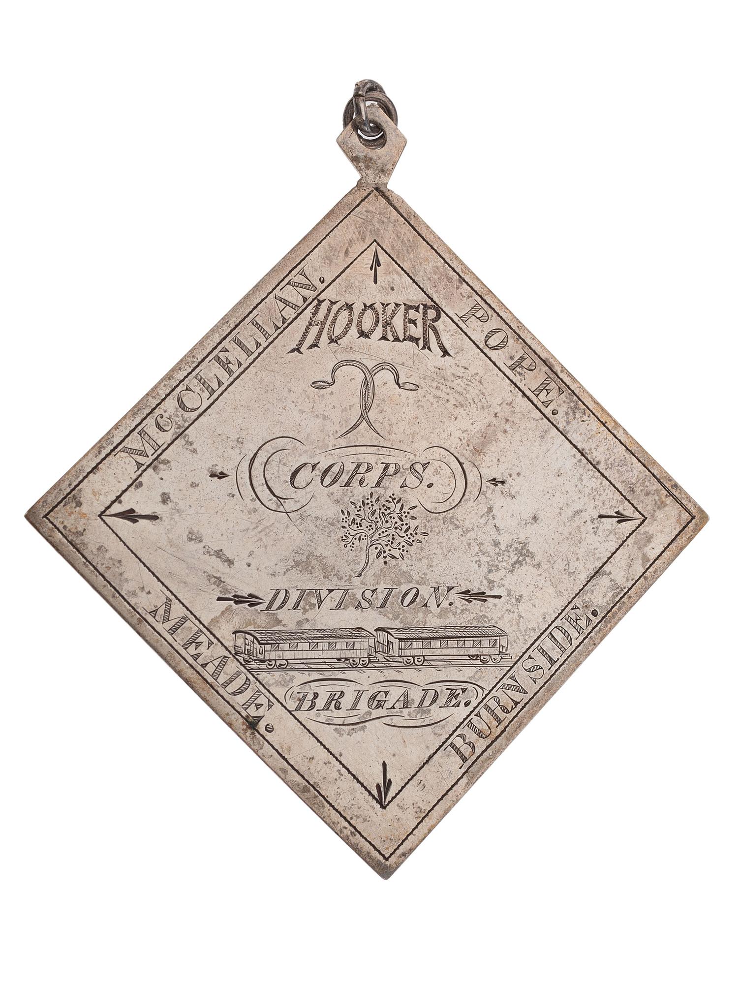 [CIVIL WAR]. III Corps badge identified to Sergeant Charles F. Browne, Company F, 1st Massachusetts Regiment, WIA Fredericksburg, Chancellorsville, and Gettysburg.