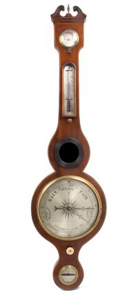 A George III Style Mahogany Wheel Barometer, Height 38 3/4 inches.