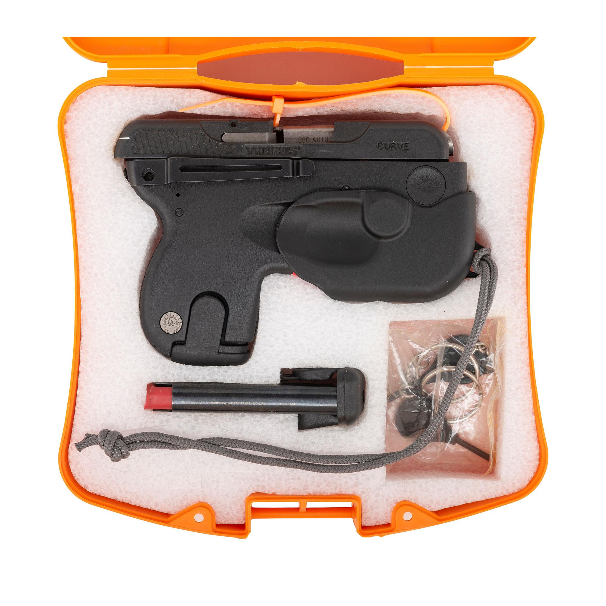 *Taurus Curve Pistol - New In Box with Laser and Light