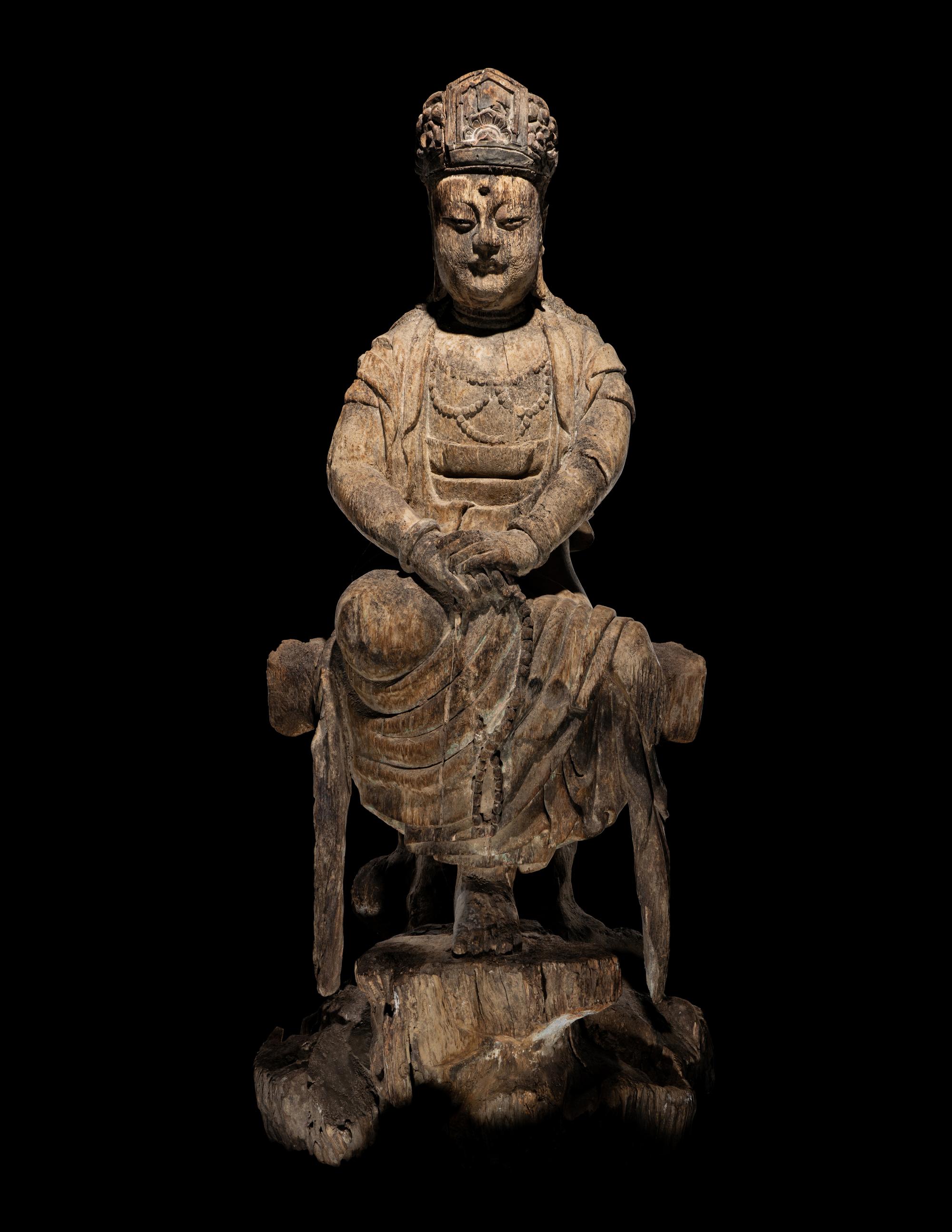 A Carved Wood Figure of Guanyin
