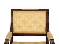 A French Empire Style Mahogany and Parcel Gilt Fauteuil