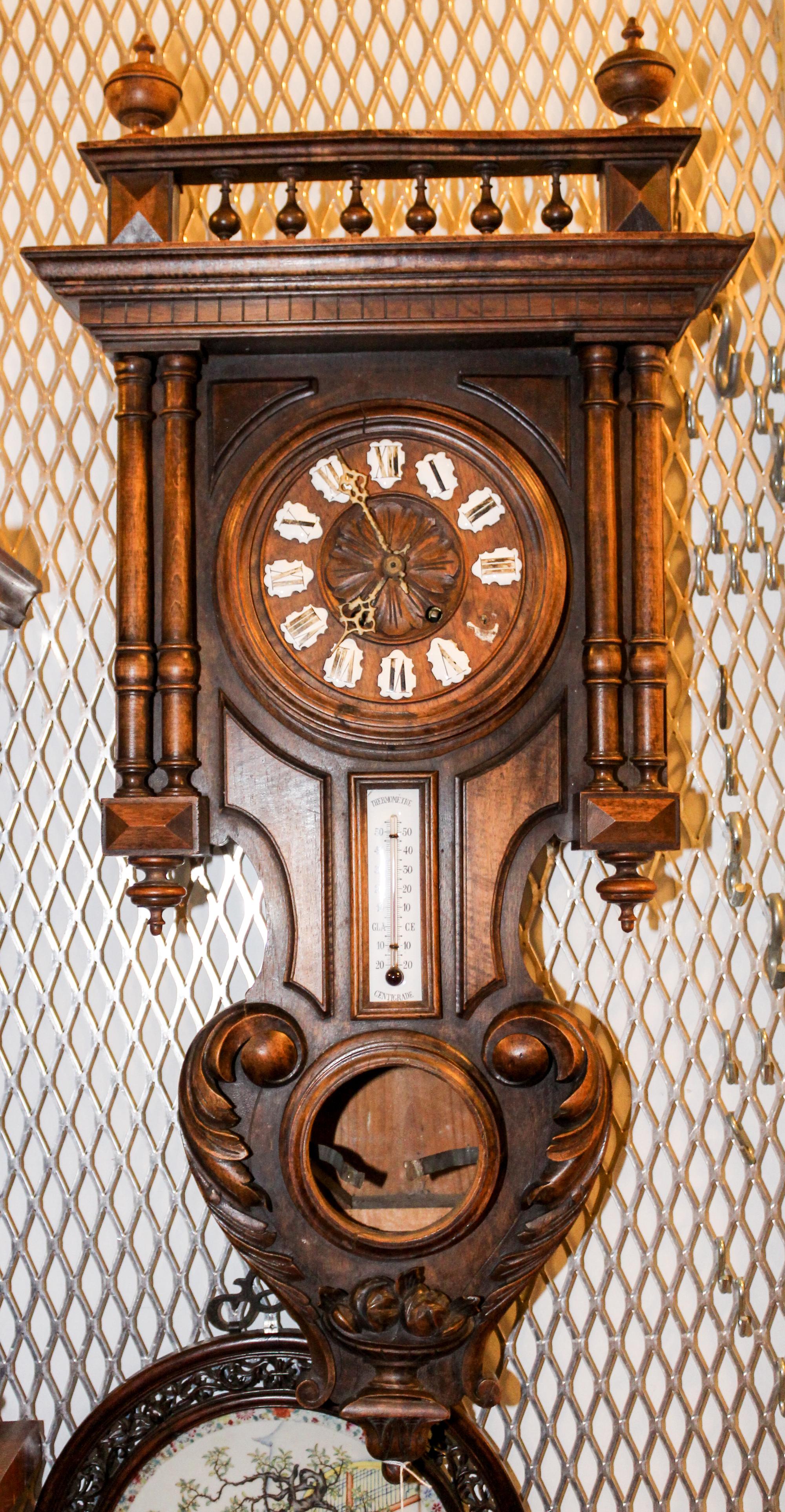 A French Walnut Wall Clock. Height overall 36 inches.