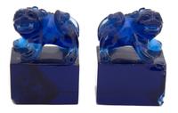 A Pair of Chinese Blue Peking Glass Foo Lions Height of lion 3 inches. — 19TH CENTURY