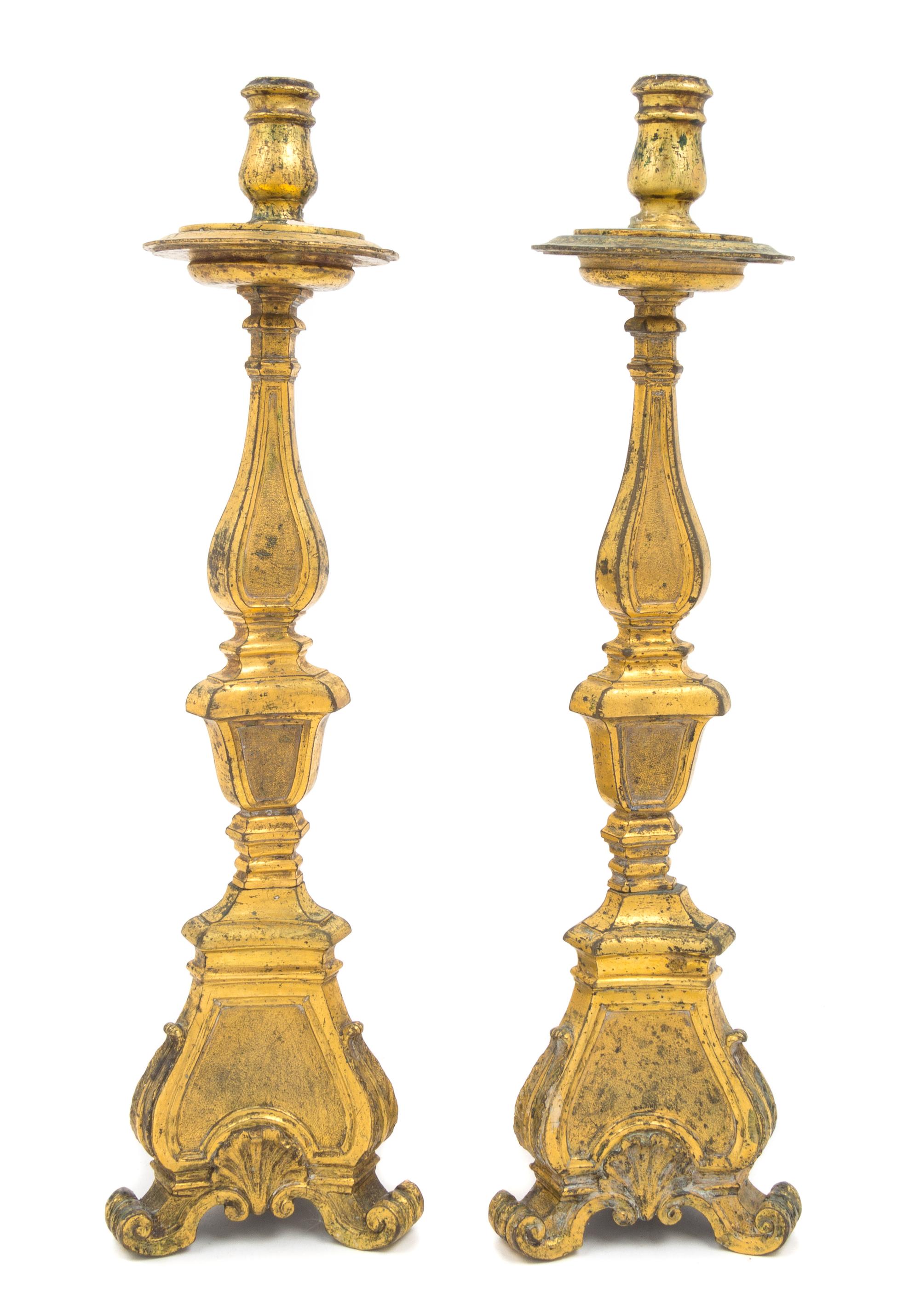 A Pair of Continental Gilt Bronze Candlesticks Height 16 1/2 inches.