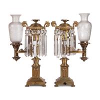 A Pair of Classical Frosted and Etched Glass Mounted Brass Oil Lamps