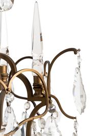 A French Gilt Metal and Glass Eight-Light Chandelier
