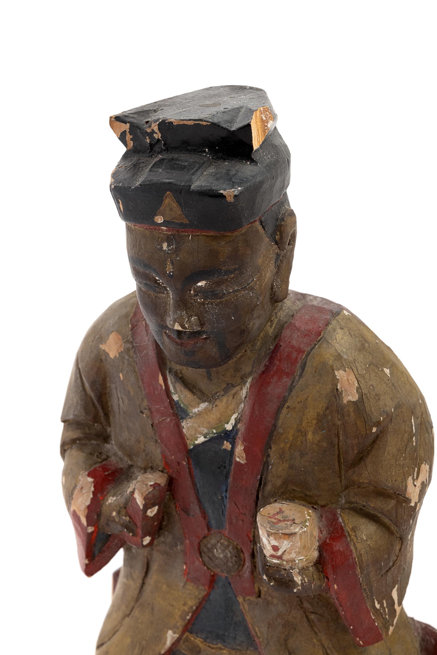 A Chinese Carved Polychrome Decorated Figure
