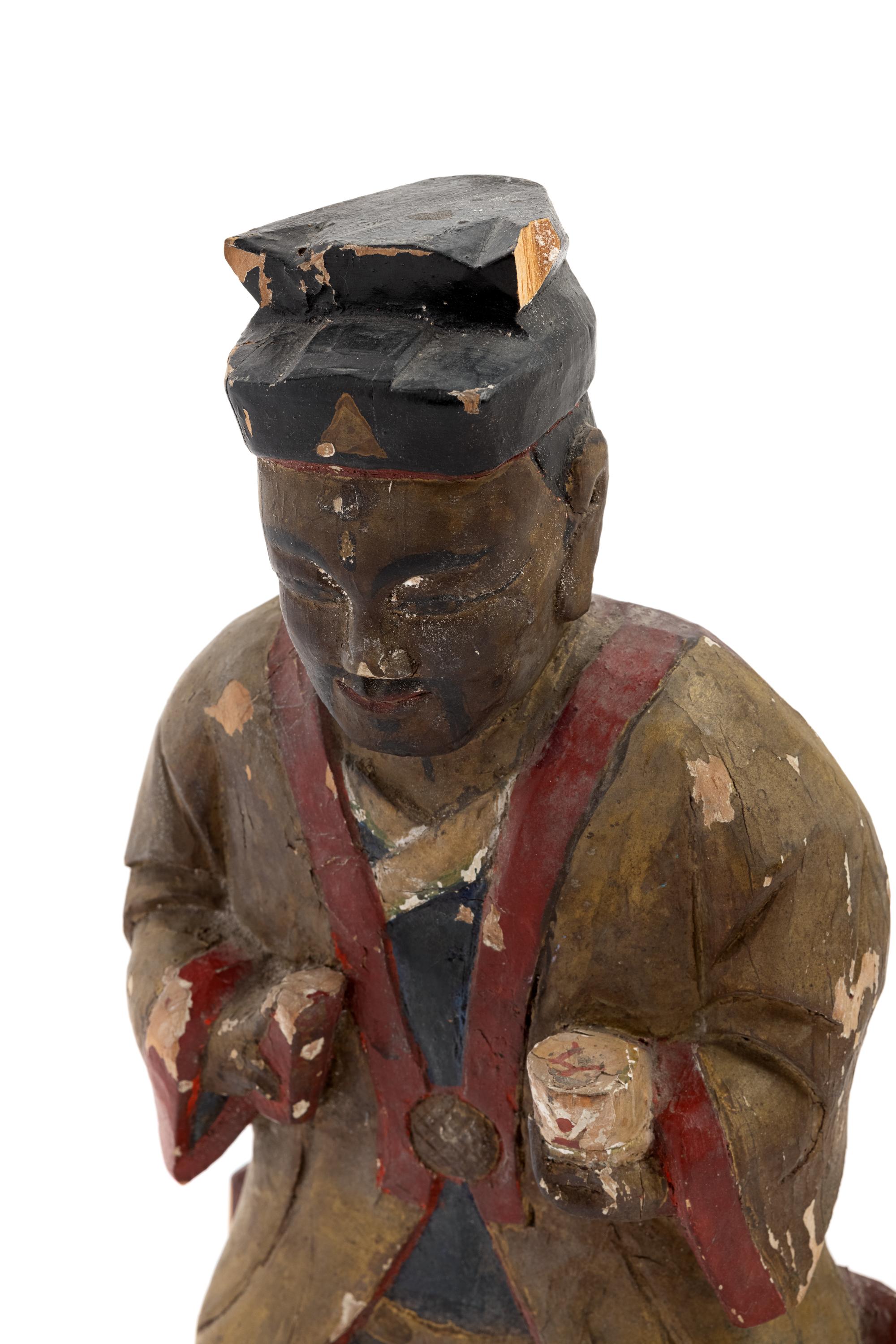 A Chinese Carved Polychrome Decorated Figure