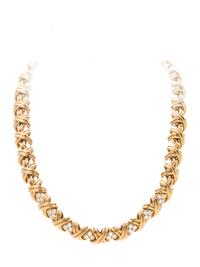 TIFFANY & CO., YELLOW GOLD AND DIAMOND 'X' COLLAR NECKLACE
