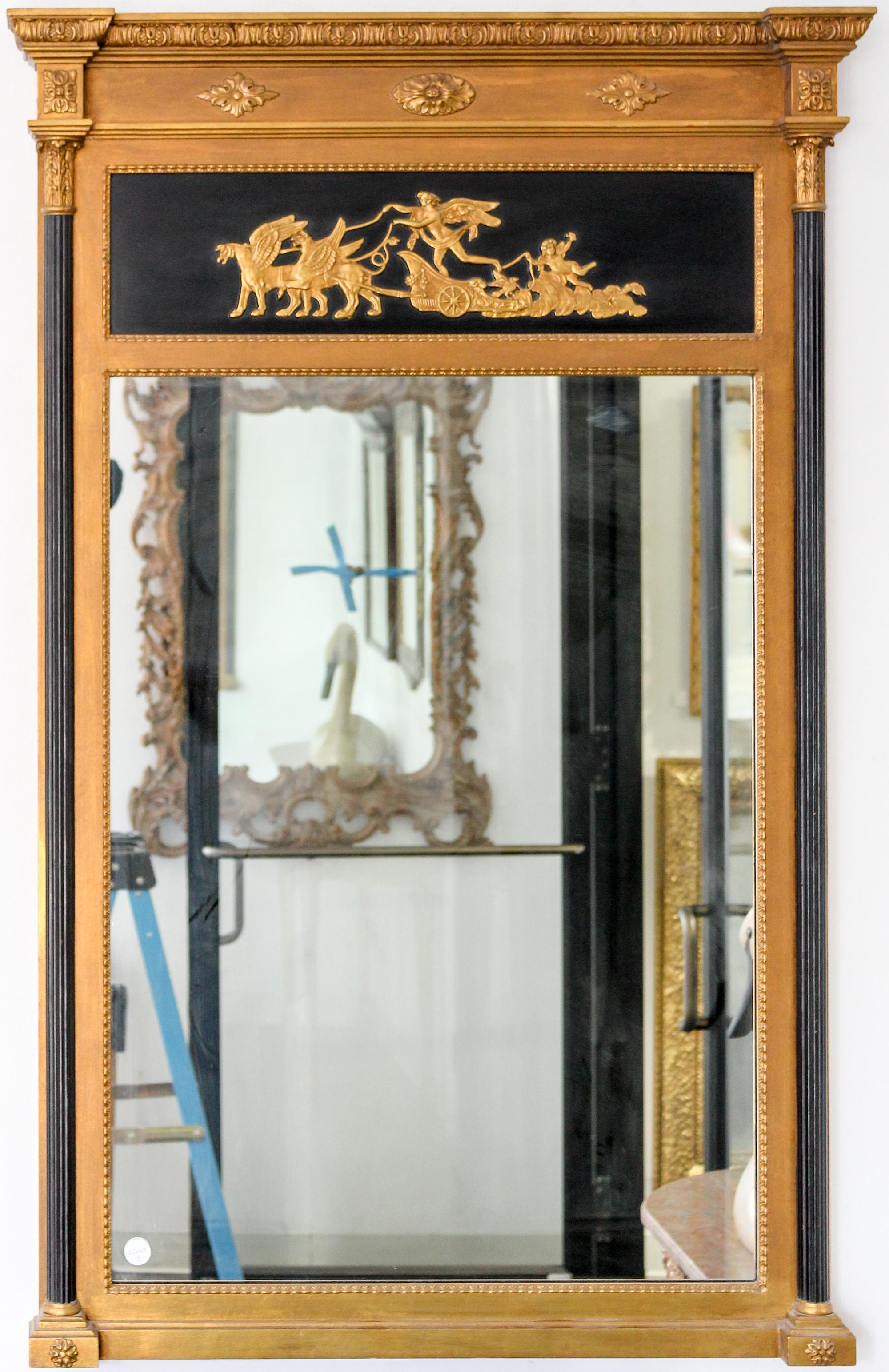 An Empire Style Ebonized and Parcel Gilt Mirror Height 52 x width 32 inches. — 19TH/20TH CENTURY