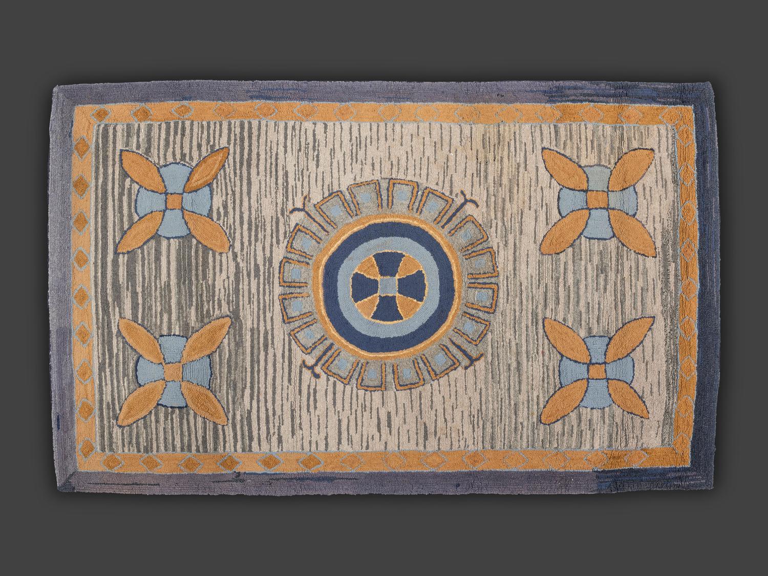 An American Medallion and Sand-Dollar Hooked Rug