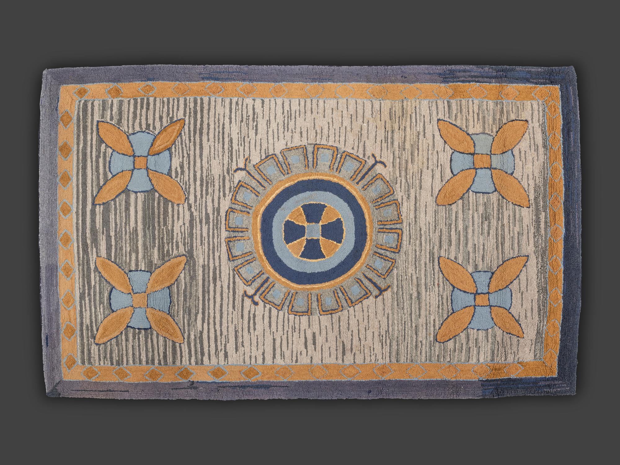 An American Medallion and Sand-Dollar Hooked Rug