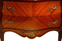 A Pair of Louis XV Style Bookmatch Veneered and Gilt Bronze Mounted Marble-Top Commodes