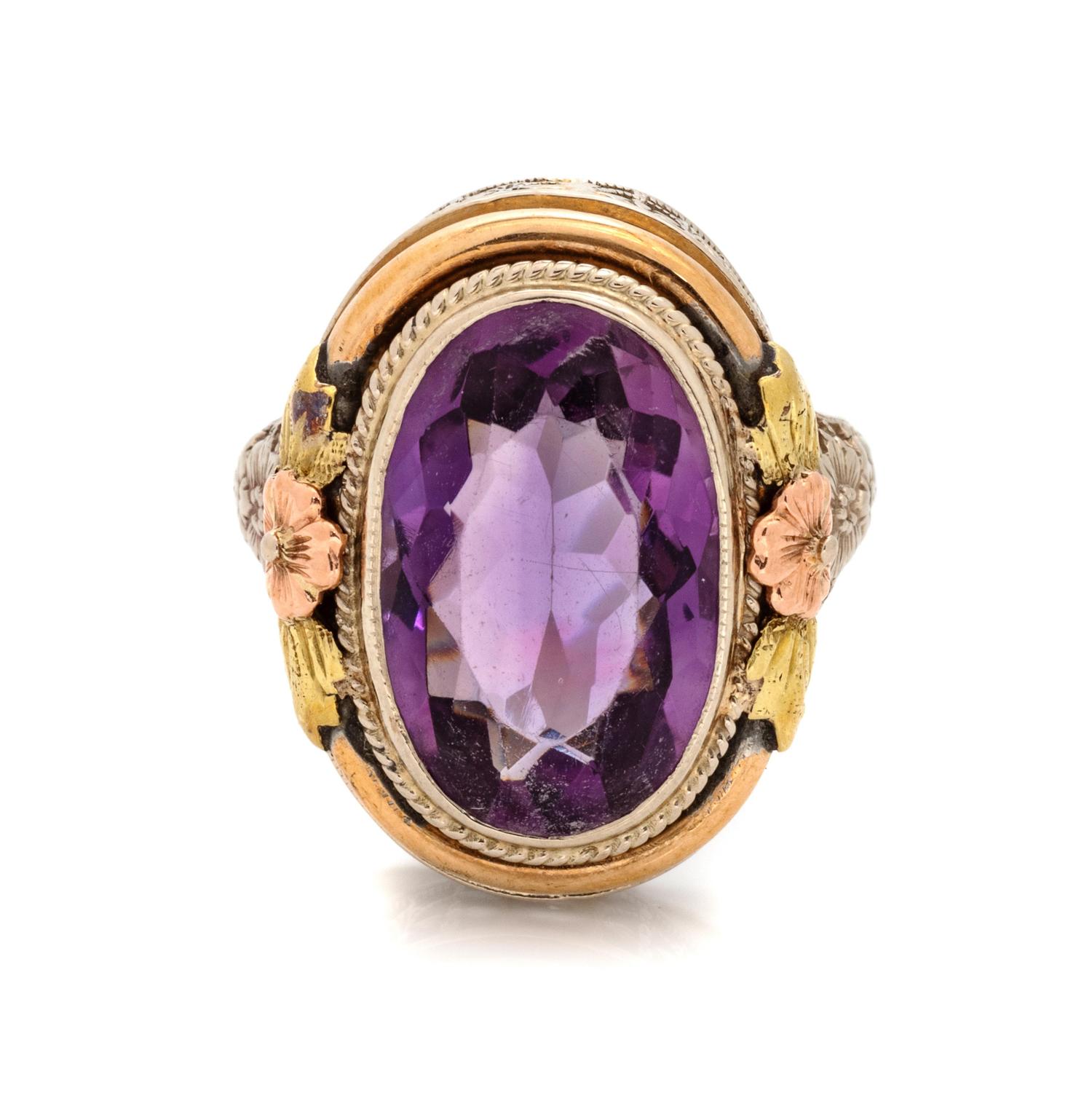 A Tricolor Gold and Amethyst Ring,