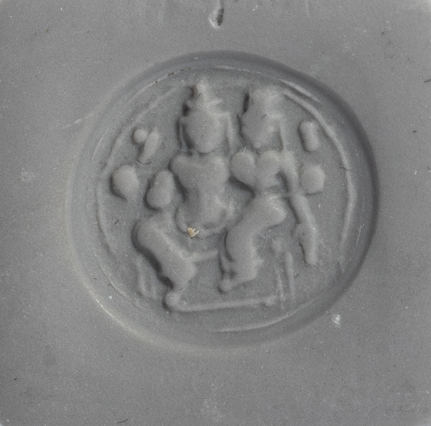 A Persian Blue Glass Intaglio with Two Figures — Set in a gold ring