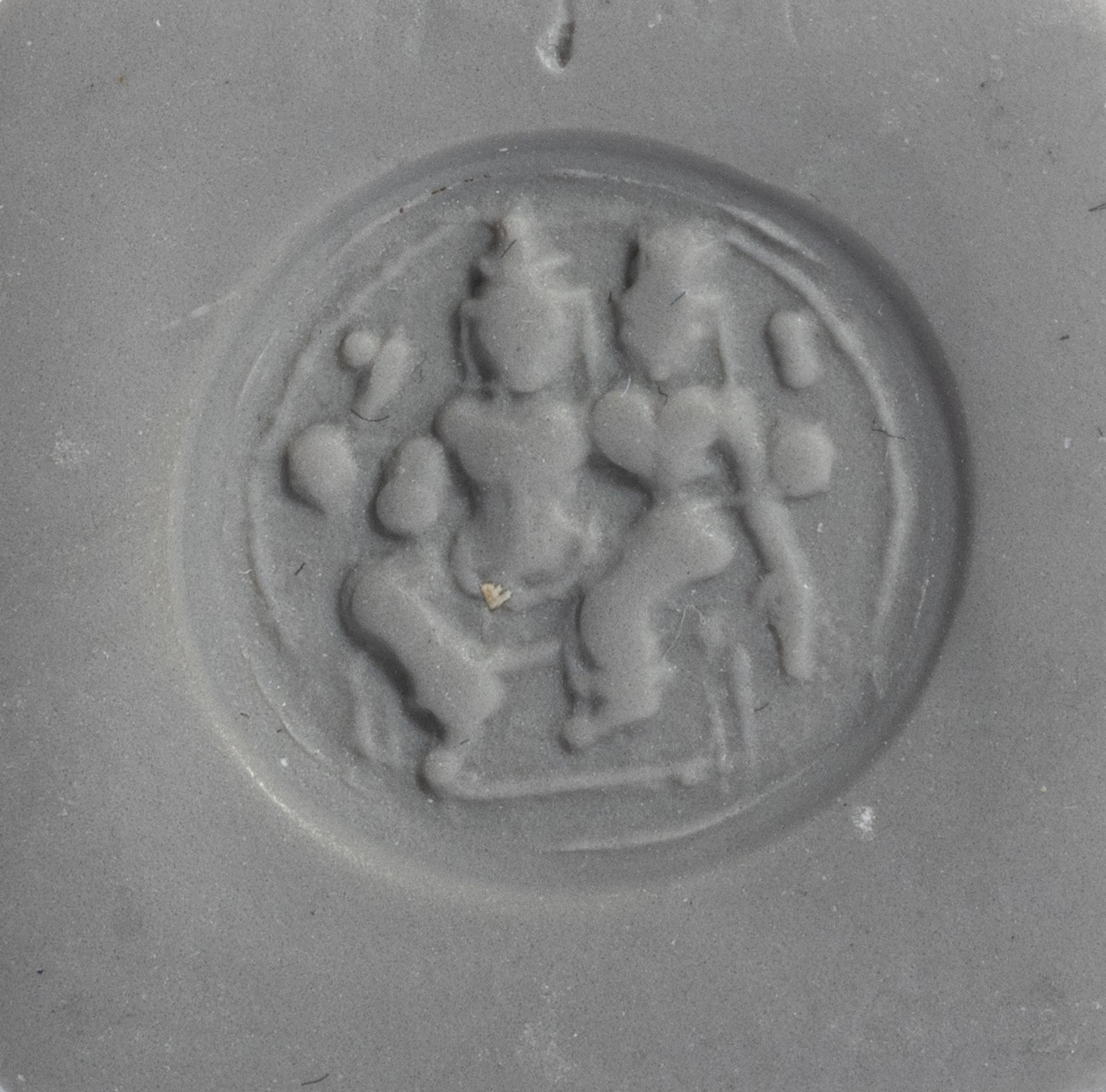 A Persian Blue Glass Intaglio with Two Figures — Set in a gold ring