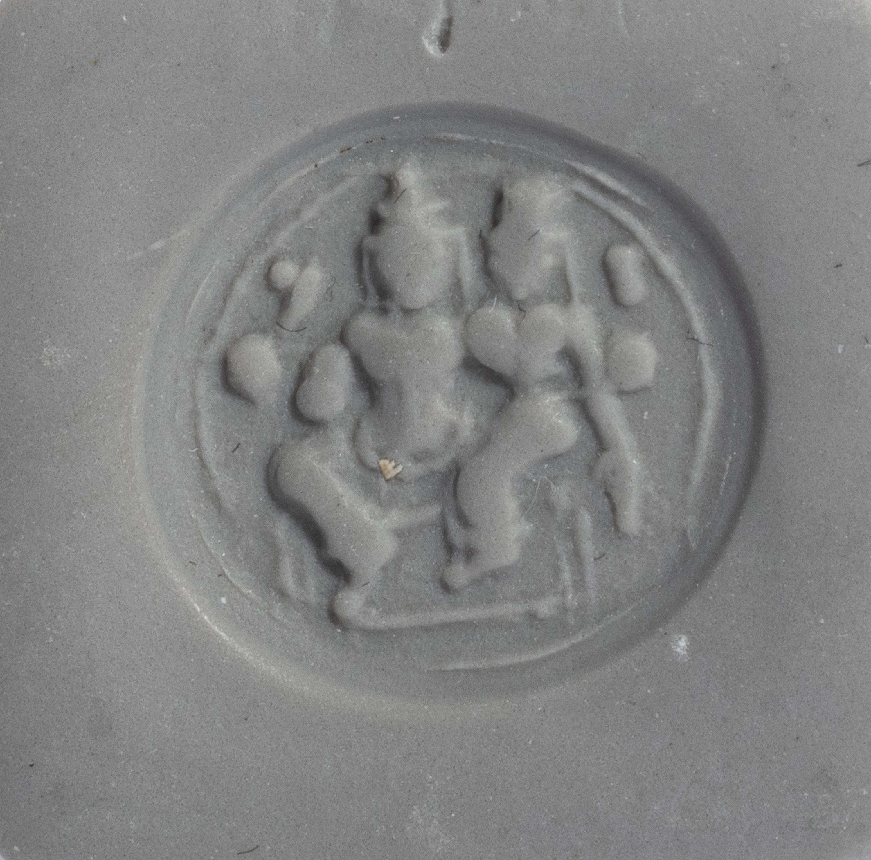 A Persian Blue Glass Intaglio with Two Figures — Set in a gold ring