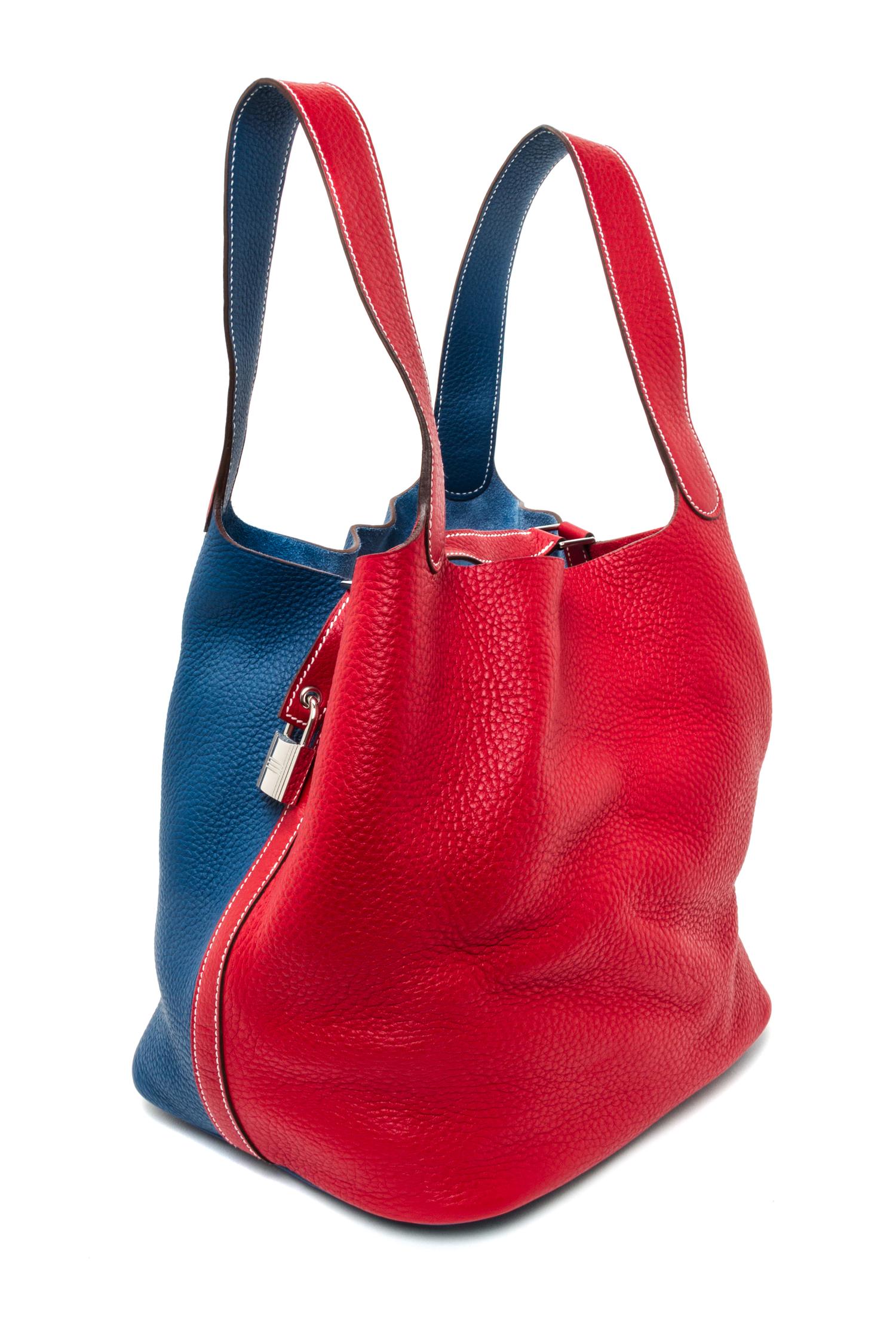 An Hermes Rouge Casaque and Bleu Taurillon Clemence Picotin Lock GM Handbag, 10.5" x 10.5" x 8.5".