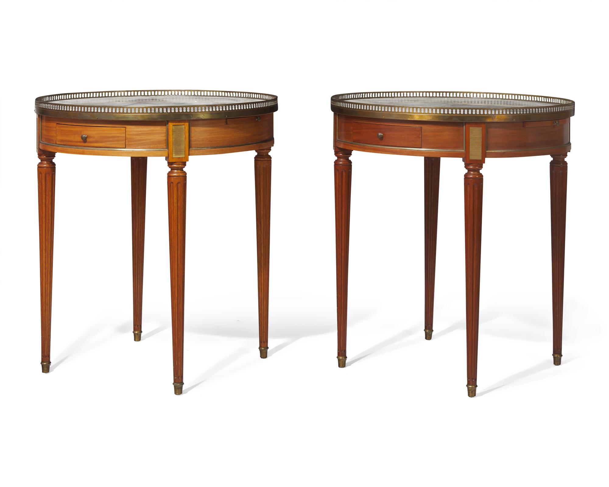 A pair of Louis XVI style brass-mounted mahogany bouillotte tables with white marble tops, 20th century