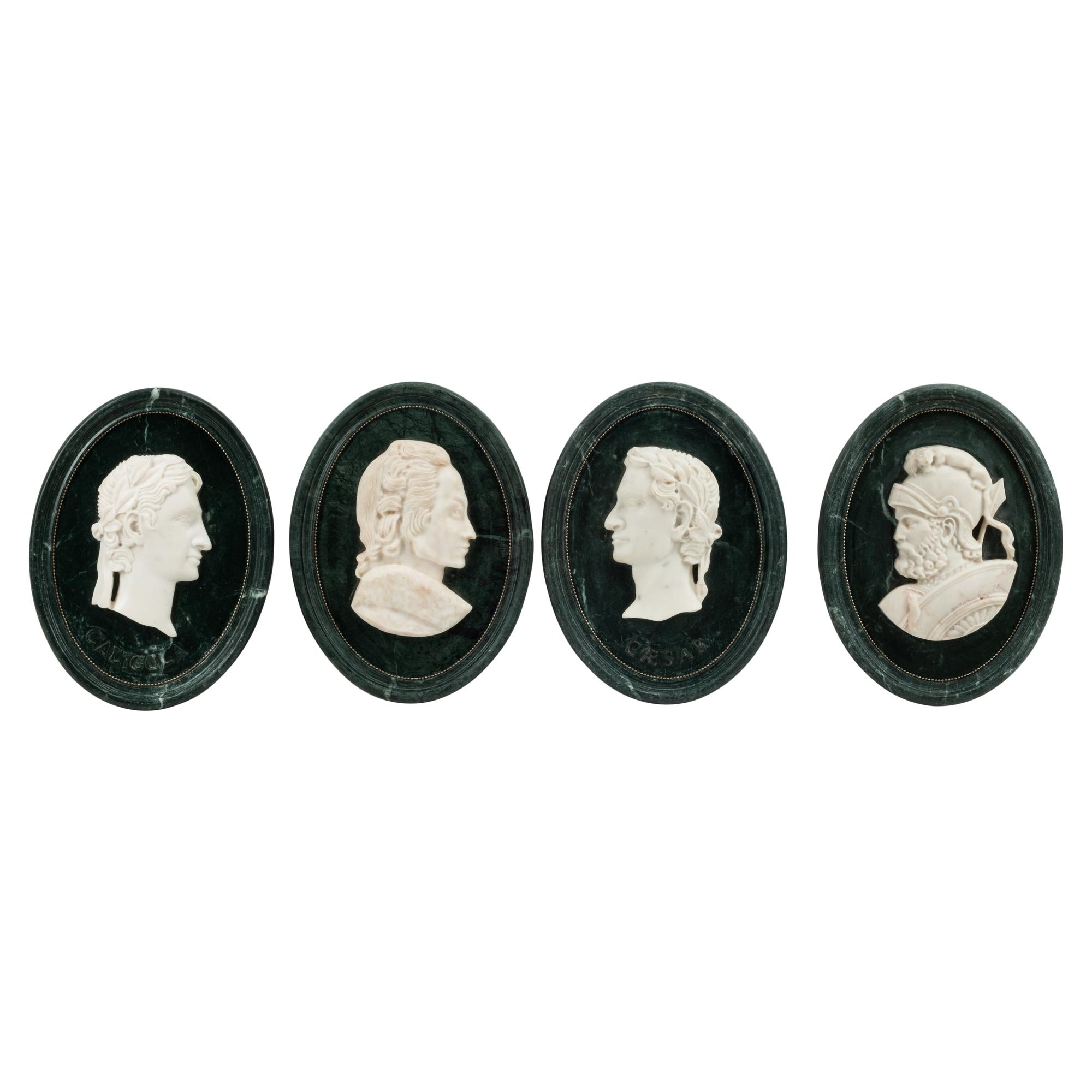 A Set of Four Italian Marble Oval Plaques
