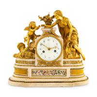 A Louis XVI Style Gilt Bronze and Marble Mantel Clock