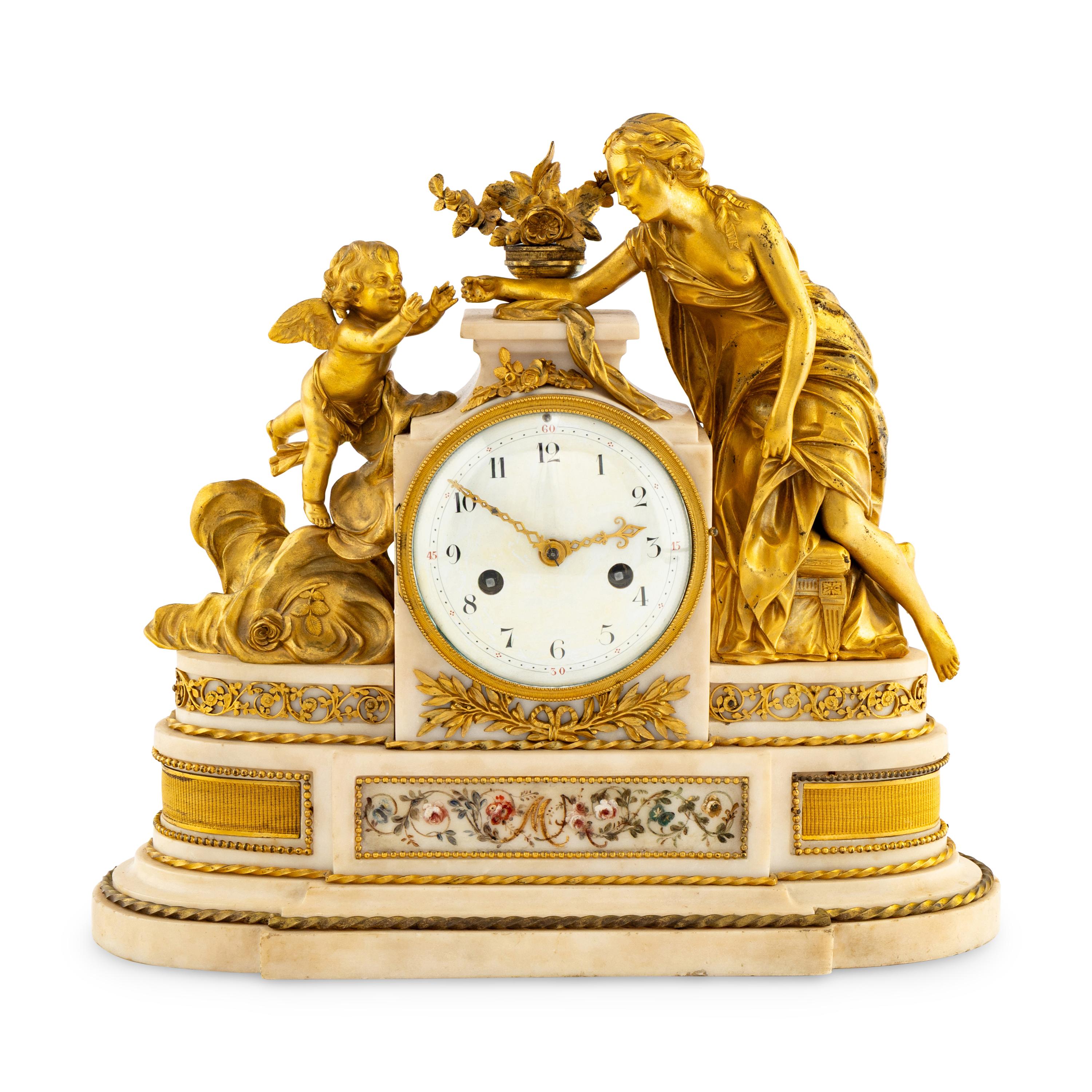 A Louis XVI Style Gilt Bronze and Marble Mantel Clock