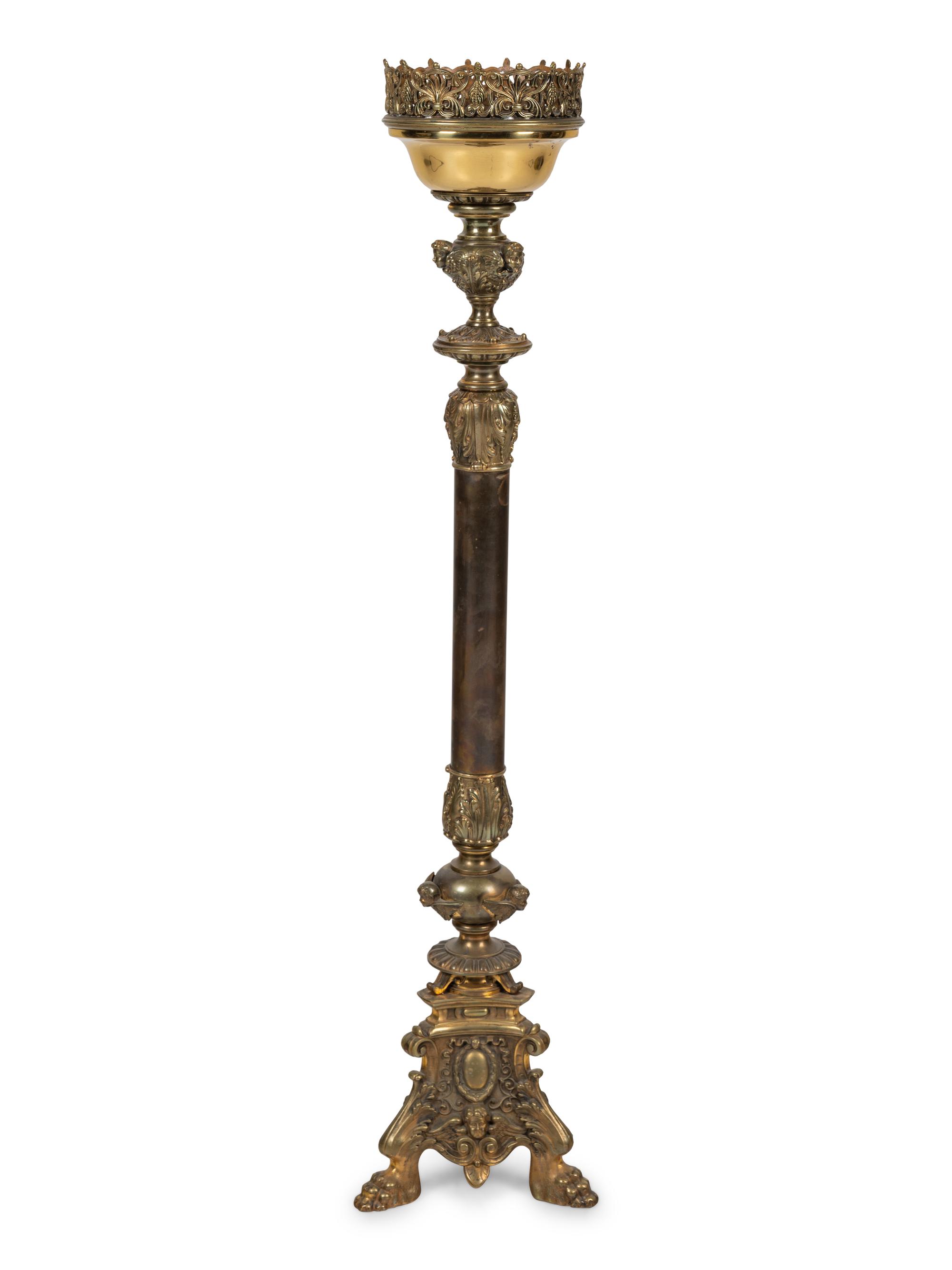 A Neoclassical Gilt Metal Pricket