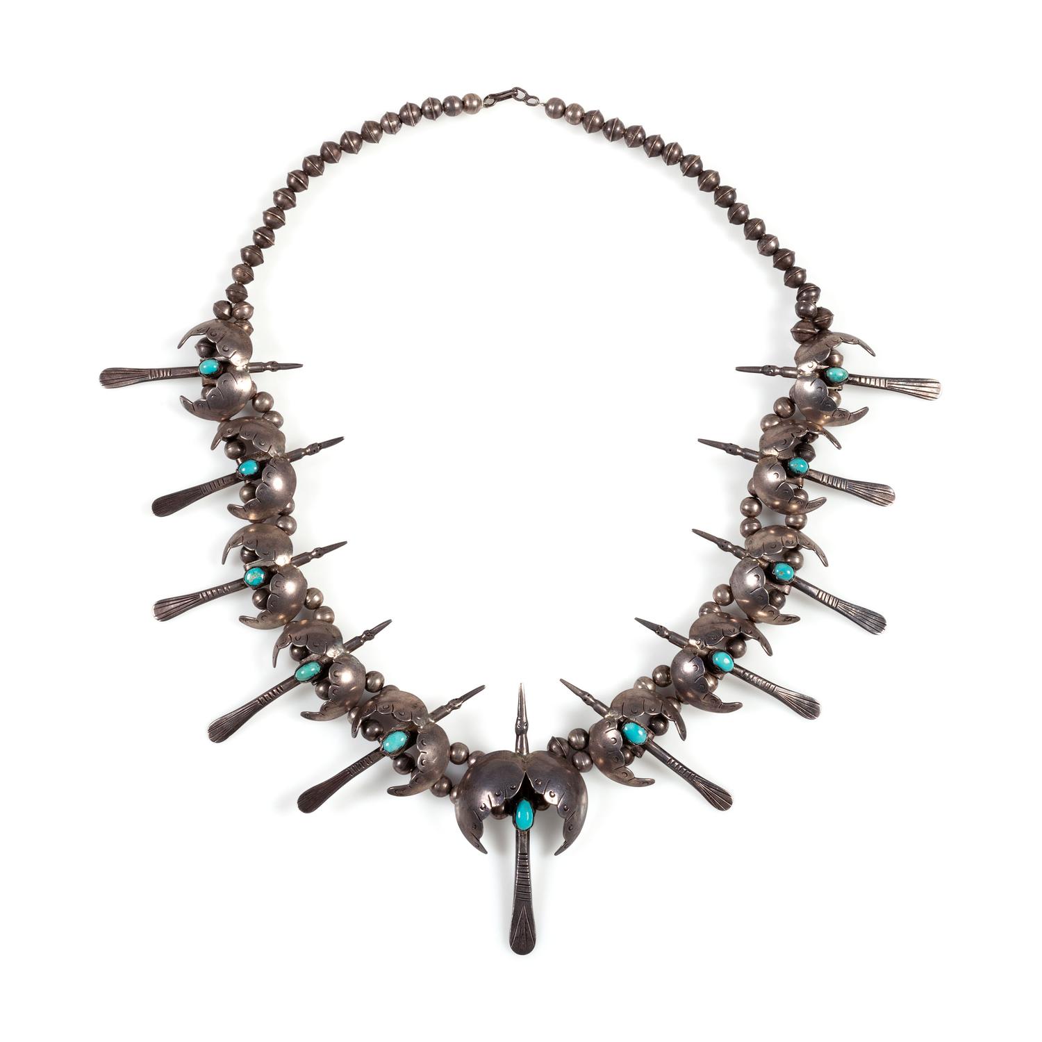 A Silver and Turquoise Peyote Bird Necklace