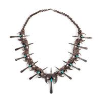 A Silver and Turquoise Peyote Bird Necklace