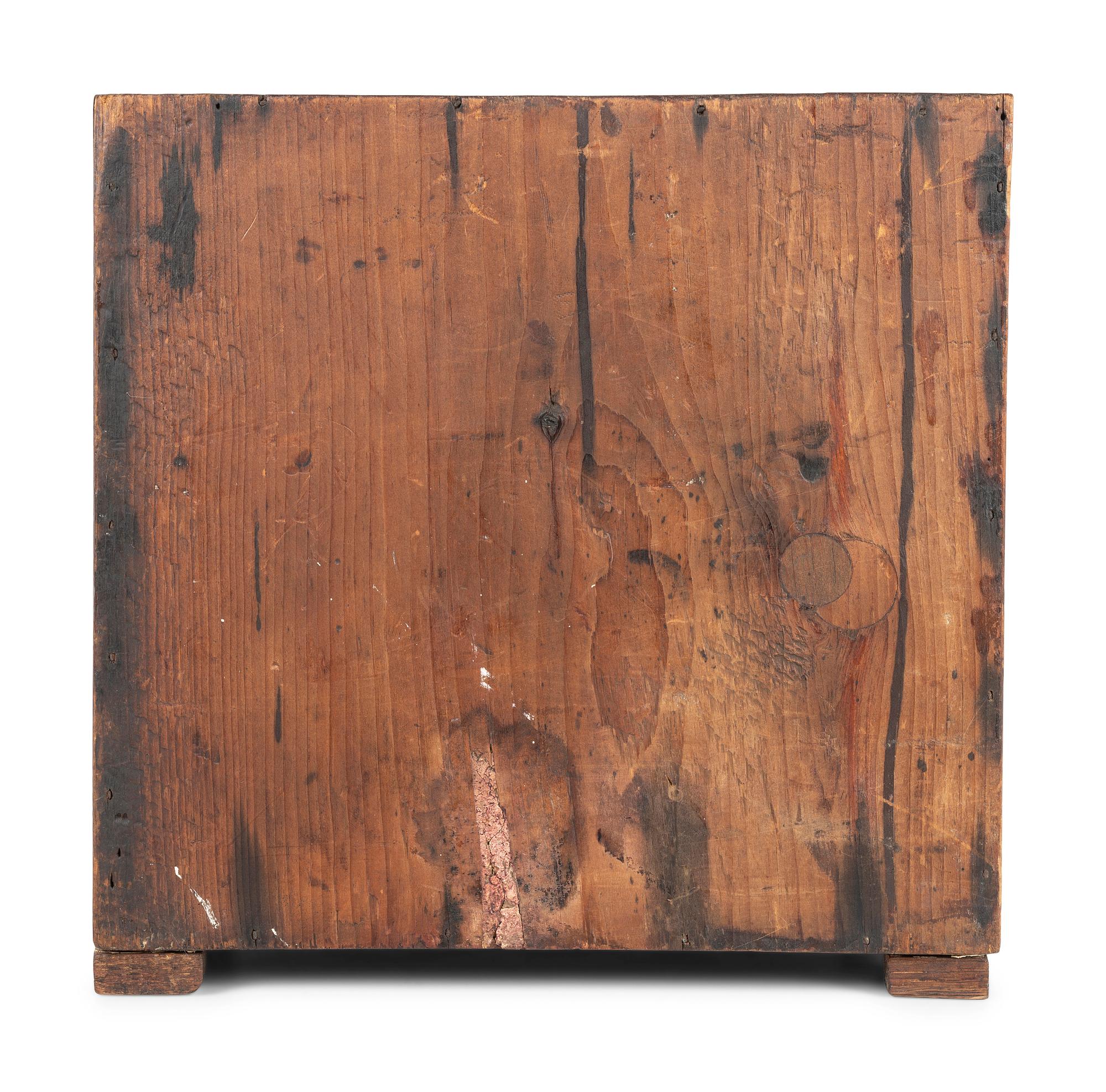 A Stained Pine Miniature Chest of Drawers
