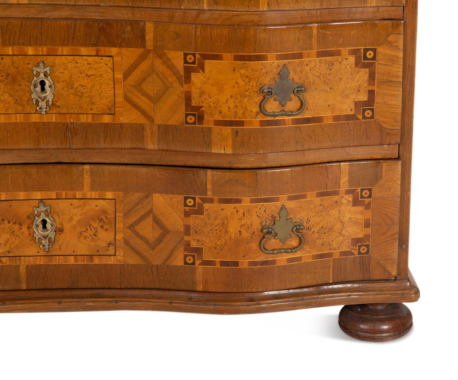 An Austrian Walnut Marquetry Commode
