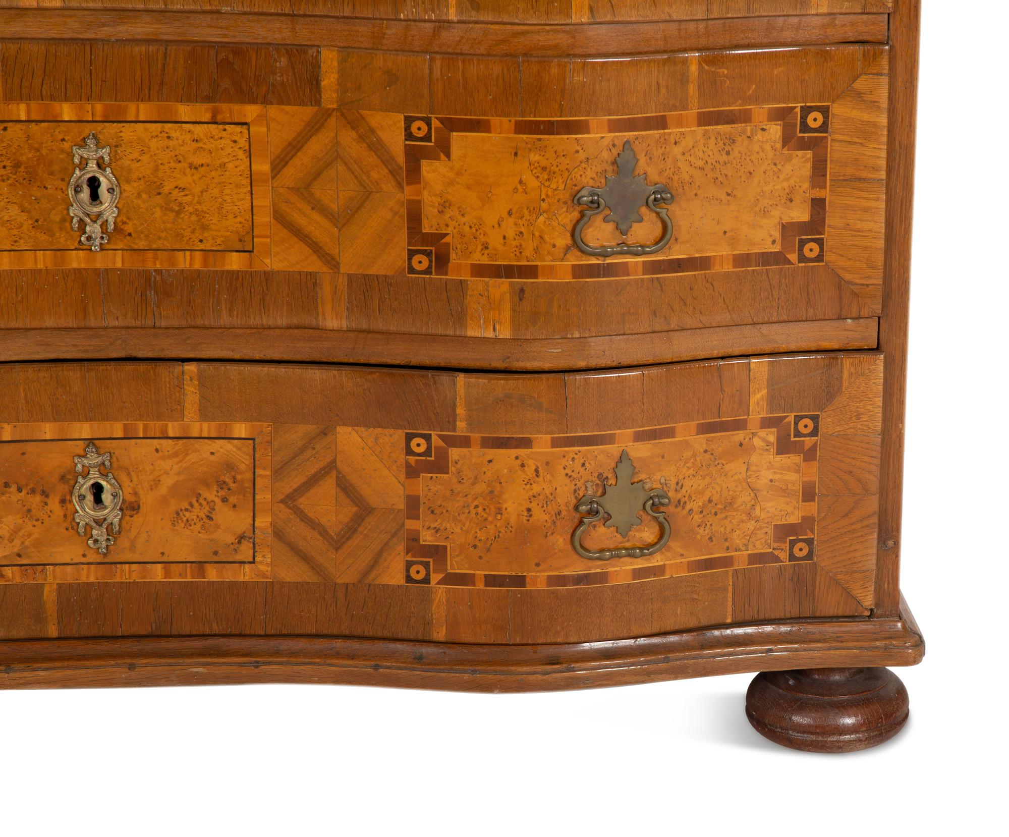 An Austrian Walnut Marquetry Commode