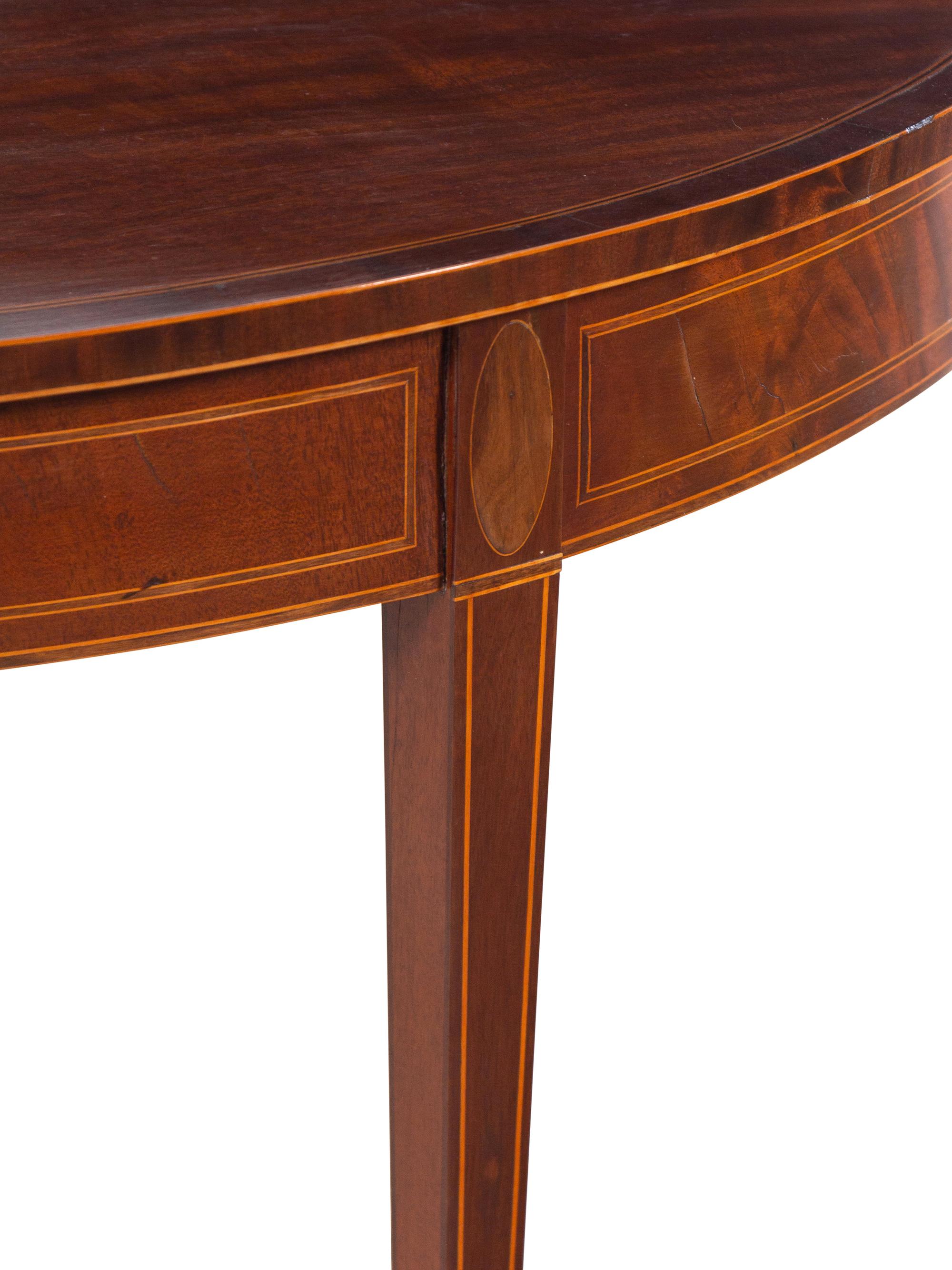 A Federal Inlaid and Figured Mahogany Demilune Game Table